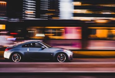A vehicle that is cruising through the streets of a city.